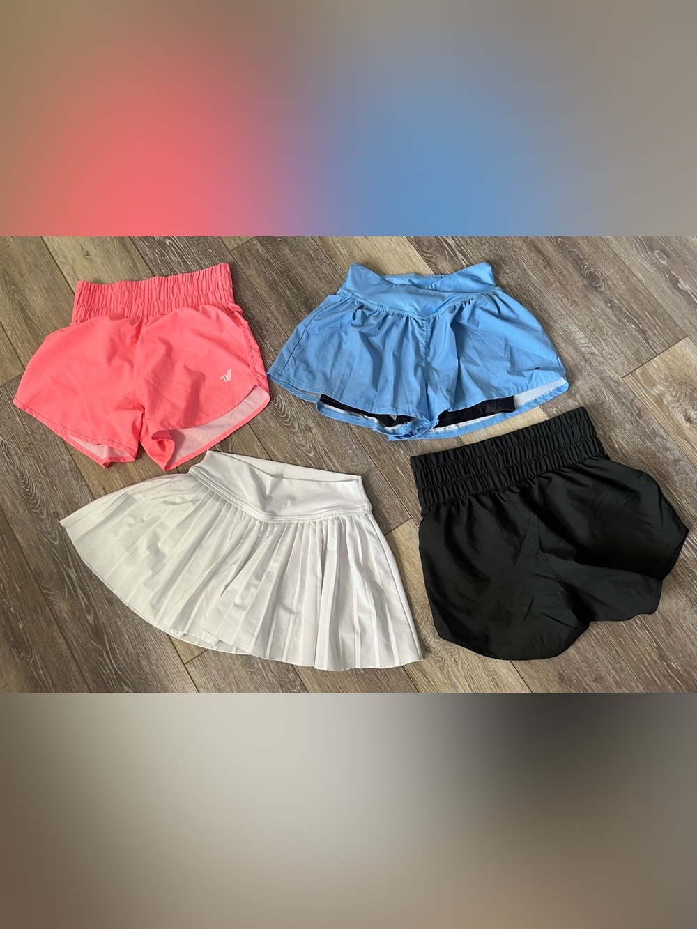 Like new 4 pr Varsity cheer shorts/skirts Coral XS, Sky Blue S, White S, Black S